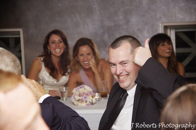 Brother of bride laughing at wedding speeches - wedding photography sydney
